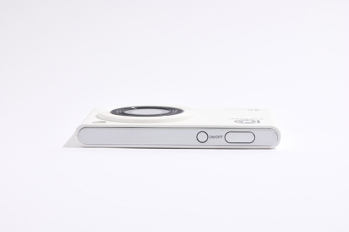 PiX Pocket Camera in White, top view, 11.8 mm thin