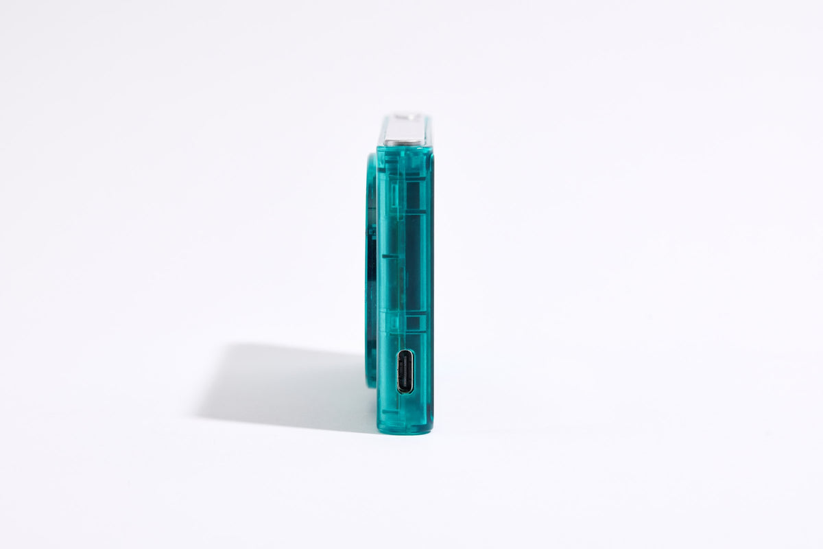 PiX Pocket Camera in Green, side view with USB-C port