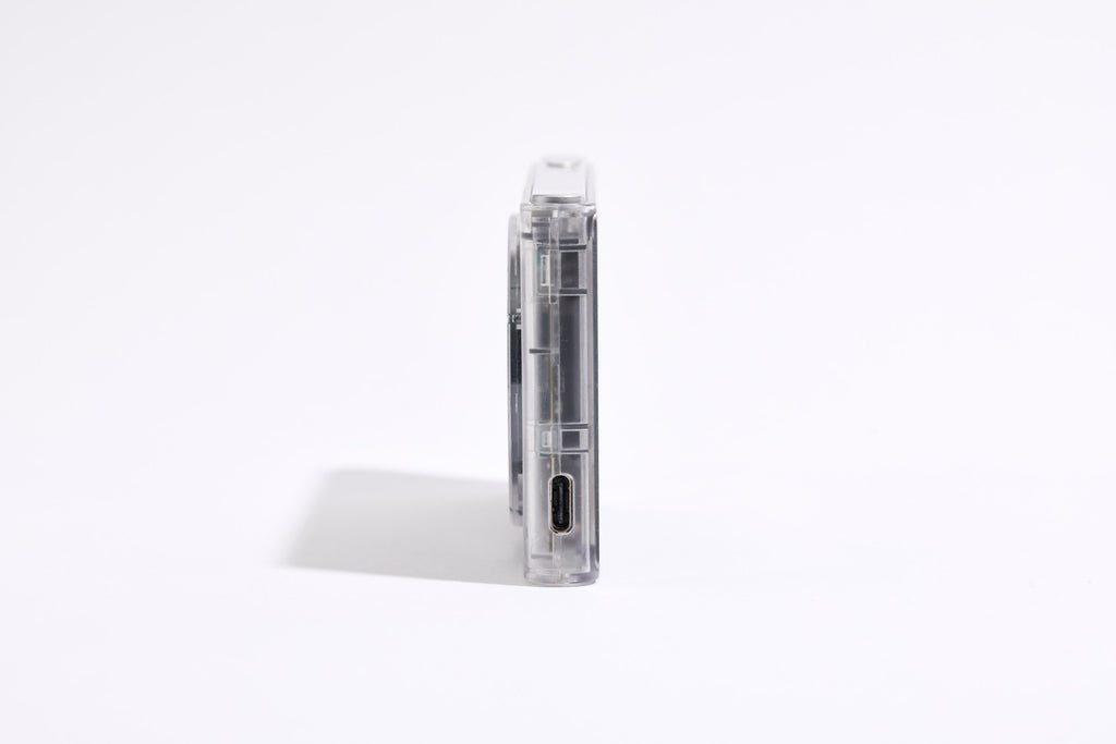 PiX Pocket Camera in Clear, side view with USB-C port