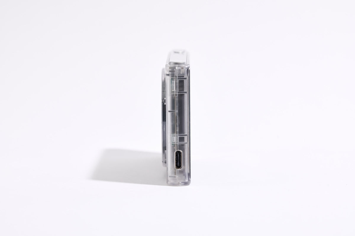 PiX Pocket Camera in Clear, side view with USB-C port
