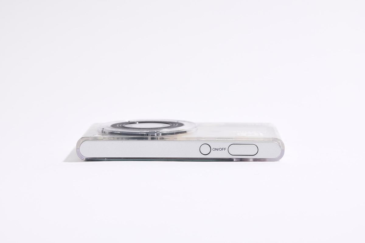 PiX Pocket Camera in Clear, top view, 11.8 mm thin