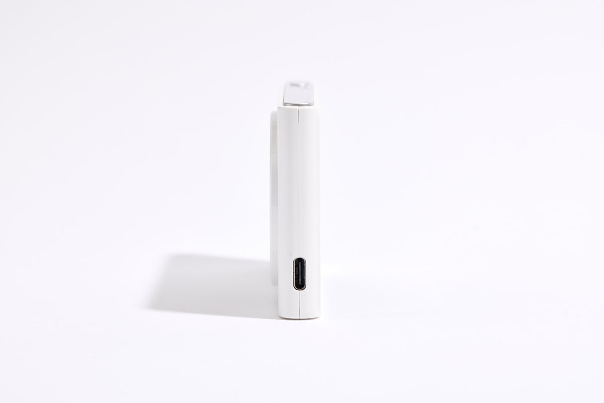 PiX Pocket Camera in White, side view with USB-C port