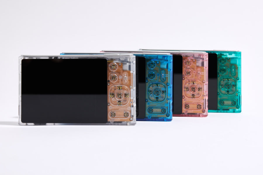 PiX in six colors, back view with screens and buttons
